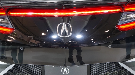 Acura car logo in black shiny vehicle