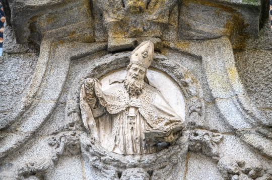 Ancient sculpture of a religious saint in the Church of San Nico