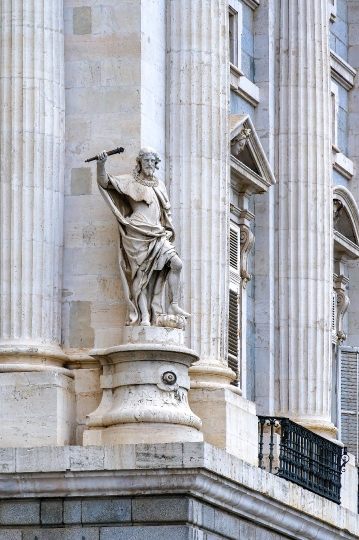 Ancient stone sculpture on the facade of the Royal Palace.