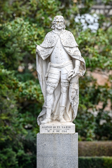 Ancient stone statue of Alonso 10 El Sabio, Madrid, Spain