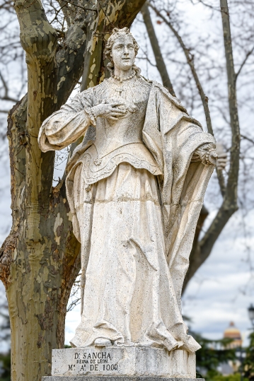 Ancient stone statue of D. Sancha, Queen of Leon in a public par