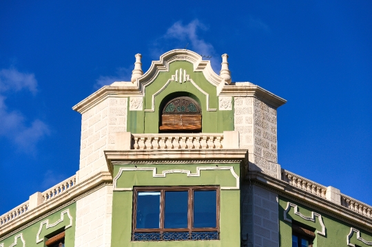 Architectural capital on top of a colonial building in Alicante,