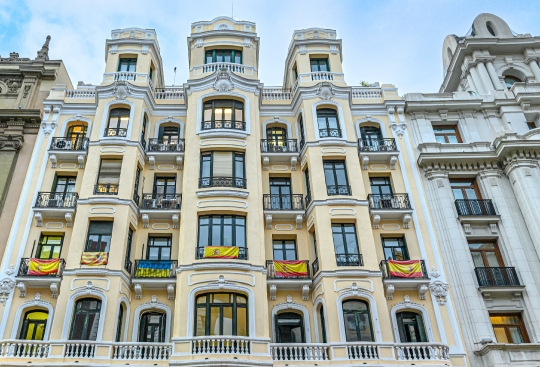 Beautiful exterior architecture of an apartment building in Madr