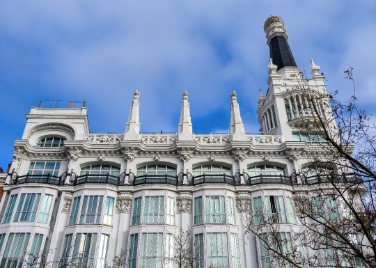 Building architecture of ME Madrid Reina Victoria Hotel.