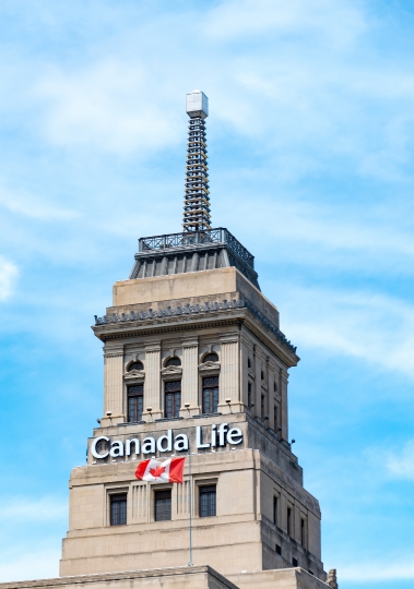 Canada Life Building with Canadian National Flag Waving, Toronto