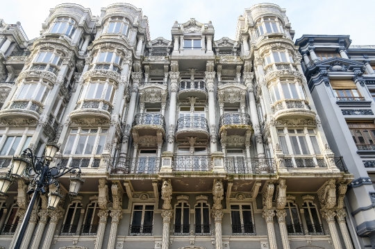 Casa del Cuitu, low-angle view of balconies and windows that are