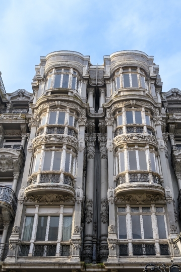 Casa del Cuitu, vertical view of balconies and windows that are