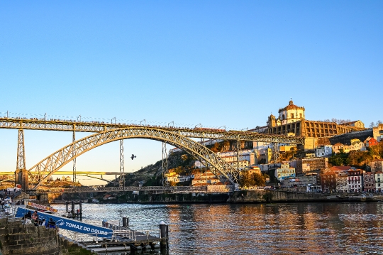 Cityscape featuring the Luis I Bridge over the Douro River, with