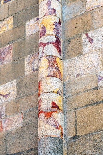 Close-up of colorful stones in the walls of the medieval cathedr