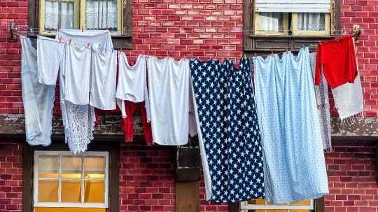 Clothesline in the facade of an old building exterior.