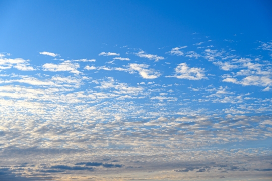 Cloud cover in a dawn sky, no people