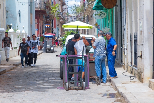 Cuban People Buying Groceries in Street