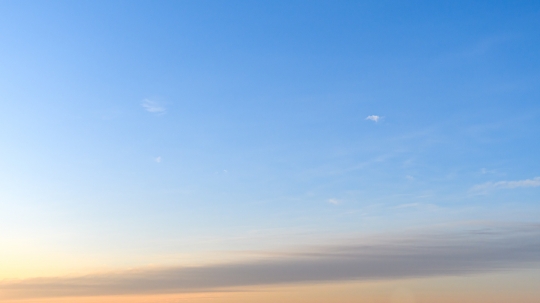 Dawn sky with pastel yellow and blue colors