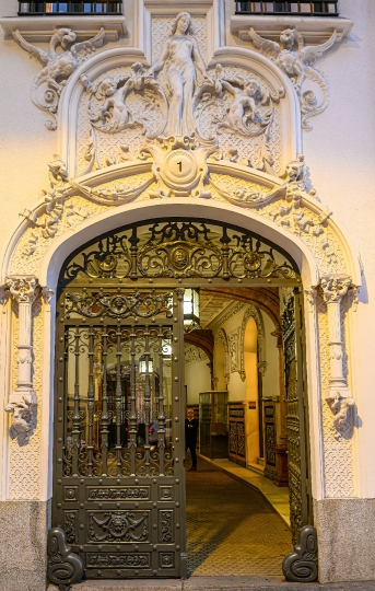 Decoration in the entrance door of a building in Gran Via.