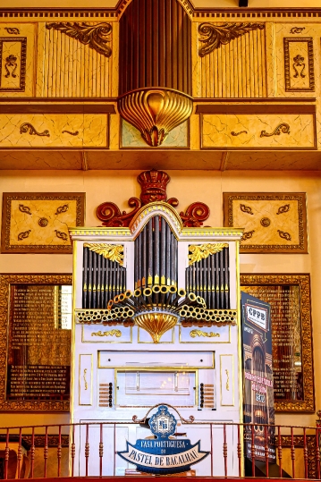 Decorative pipe organ inside the business named ìCasa Portugues