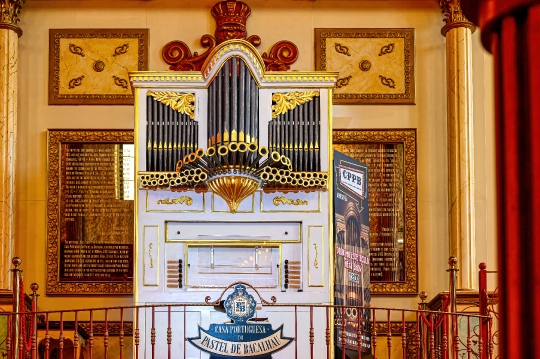 Decorative pipe organ inside the business named ìCasa Portugues