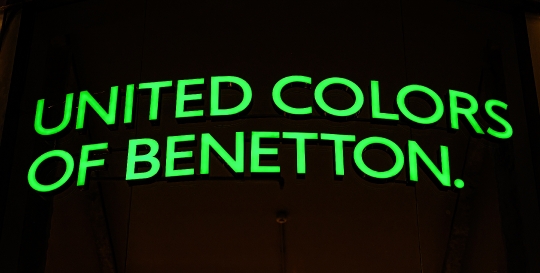 Illuminated sign for United Colors of Benetton.