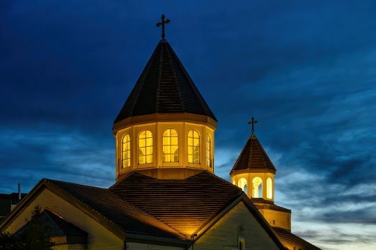 Illuminated tower dome on the St. Mary Armenian Apostolic Church