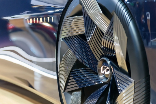 Infinity led light logo in the rim wheel of a car.