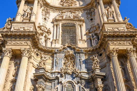 Intricate architectural features in the mid-section of the facad