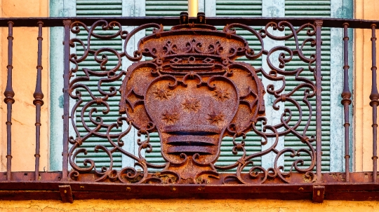 Metal Coat of Arms in Balcony Railing