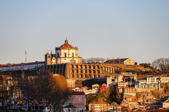 Monastery Serra do Pilar and the cityscape illuminated by the go