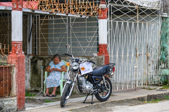 Motorcycle On Sale, Cuban Woman