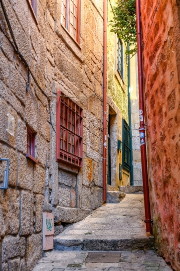 Narrow medieval alleyway in Porto, Portugal