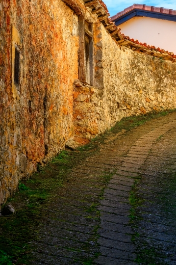 Narrow street and colonial buildings, Cofino, Asturias, Spain