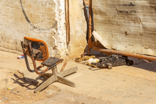 Old Chair by Garage Door