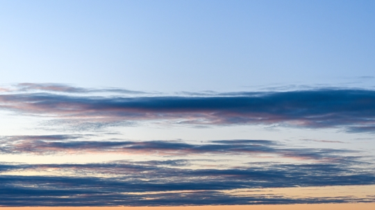 Parallel clouds in a morning sky