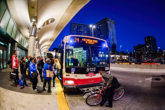 Passengers Boarding a TTC Bus