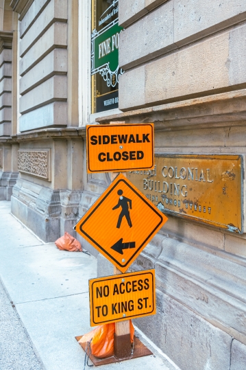 Pedestrian Sign In Sidewalk