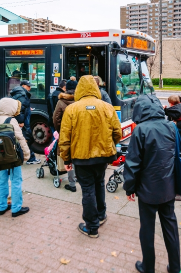 People Boarding A TTC Bus