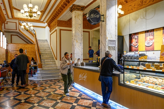 People in a McDonald_qt_s interior, Madrid, Spain