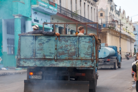 People Transporting in Rear of a Truck