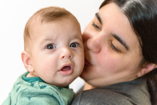 Portrait of baby boy with his mother.