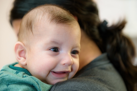 Portrait of baby boy with his mother.