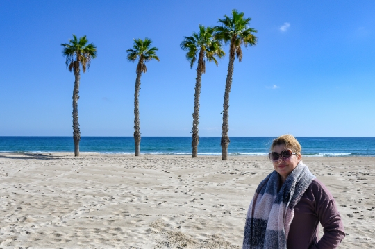 Portrait of tourist woman in San Juan Beach, Alicante, Spain