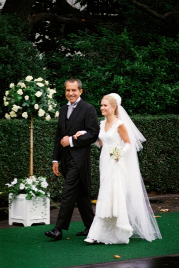 President Nixon escorts daughter Tricia to her wedding in the Wh