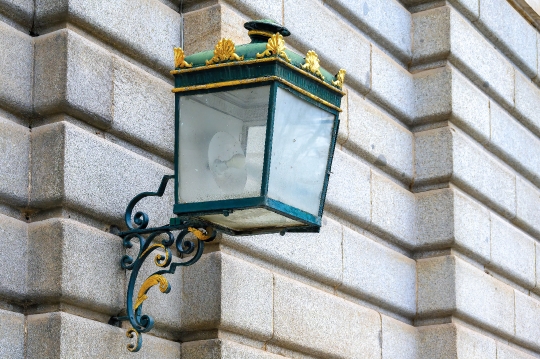 Rectangular lantern of a wall-mounted lamp on the exterior walls