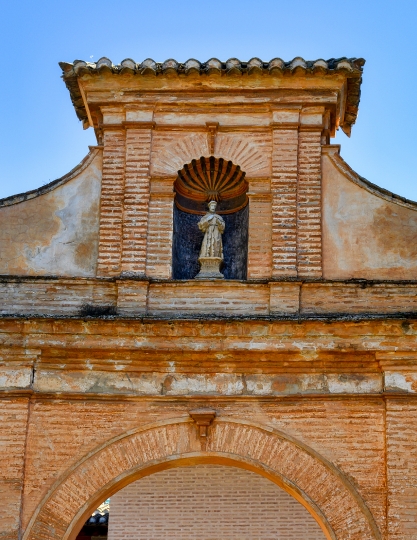 Relgious Saint Sculpture in Ancient Door