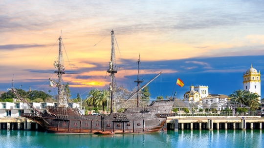 Replica of an ancient ship in the riverbank of the Guadalquivir