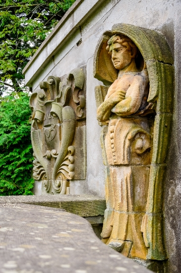 Side View of Ancient Statue