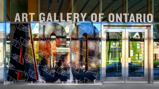 Sign at the entrance of the Art Gallery Ontario (AGO). Front vie