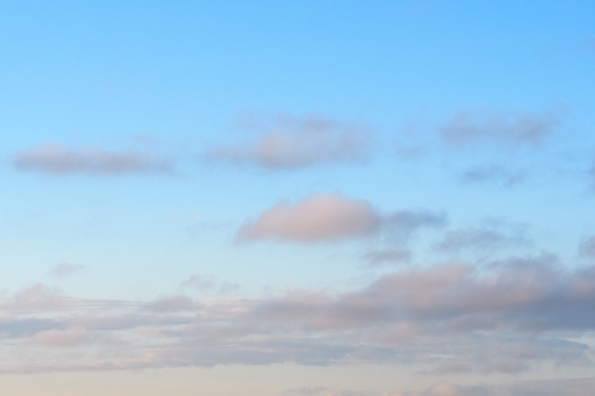 Soft Clouds In Gentle Blue Sky