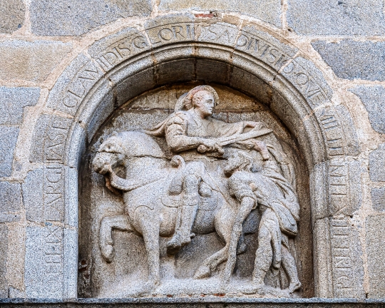 Stone relief sculpture of San Martin on the facade of the buildi