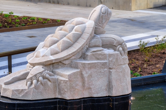 Stone sculpture of a turtle in the Spirit Garden at Nathan Phill