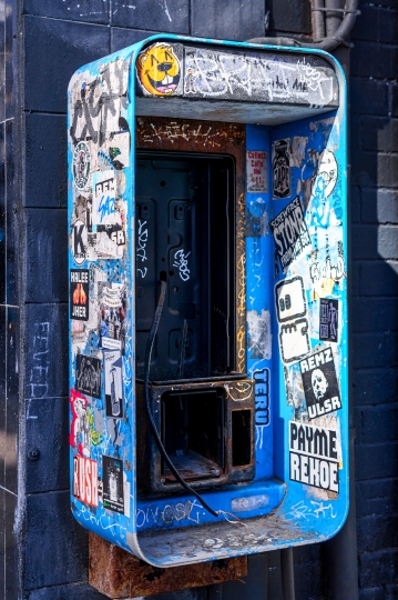 The box of a removed payphone in the downtown district.