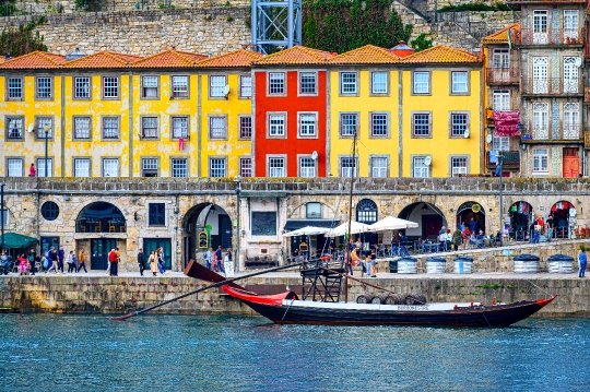 Traditional rabelo boat on the waters of the Douro River, with t